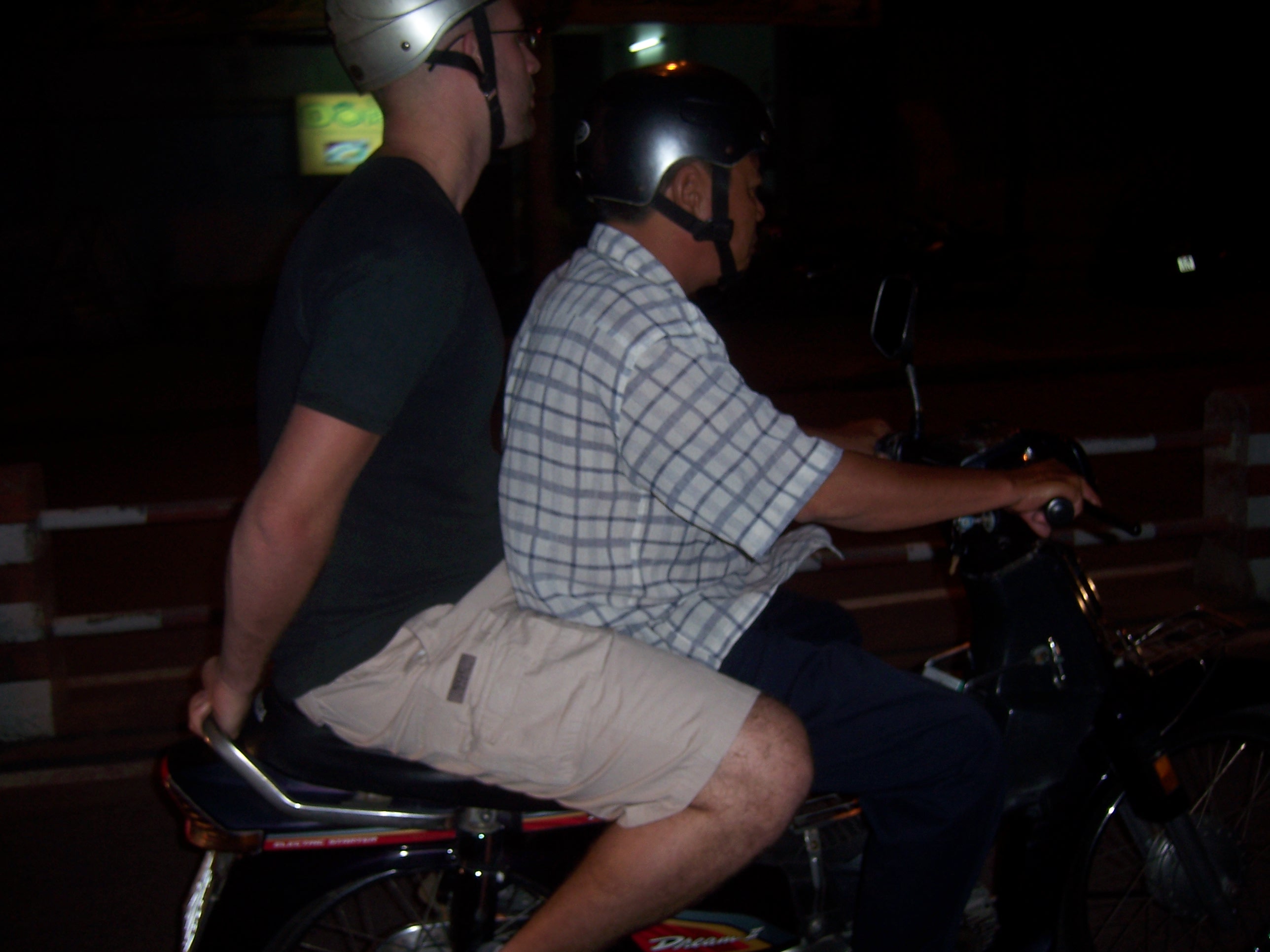 Riding pillion with Tung at night