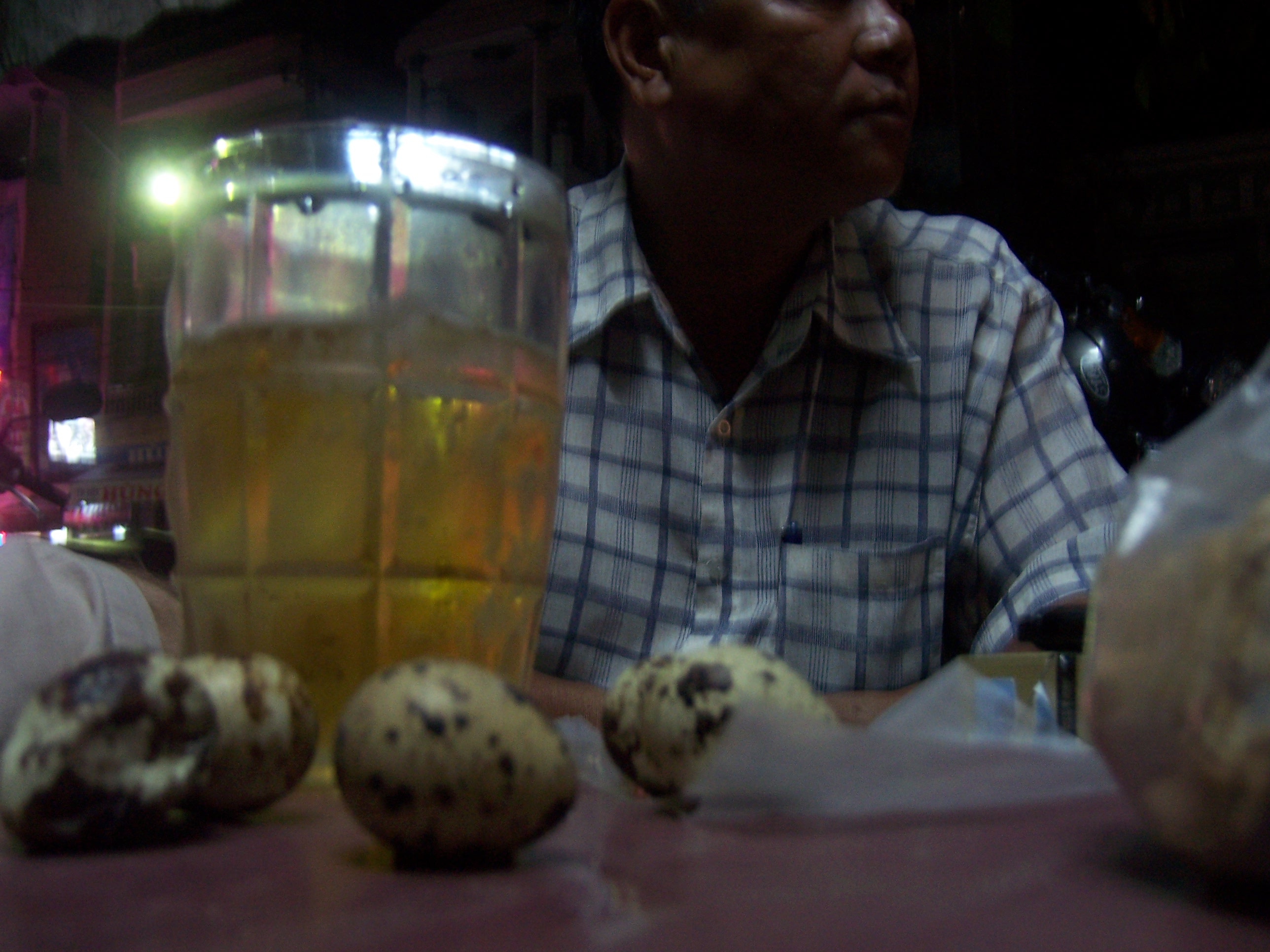 Beer glass and quail eggs with Tung in profile